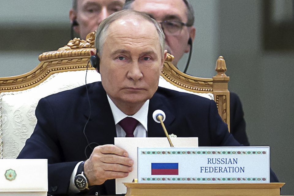 Vladimir Putin delivers his speech at the conference (Sergei Bobylev, Sputnik, Kremlin Pool Photo via AP)