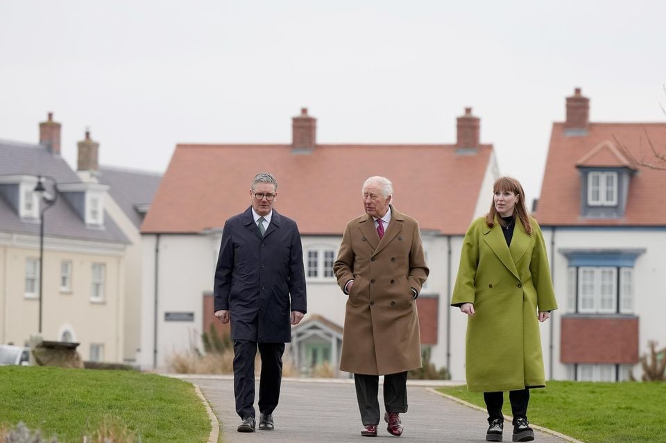 The trio stroll to the Kew An Lergh development in Newquay (Alastair Grant/PA)