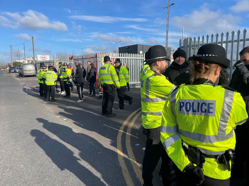 Police on hand at a refuse depot as the indefinite strike began (Matthew Cooper/PA)