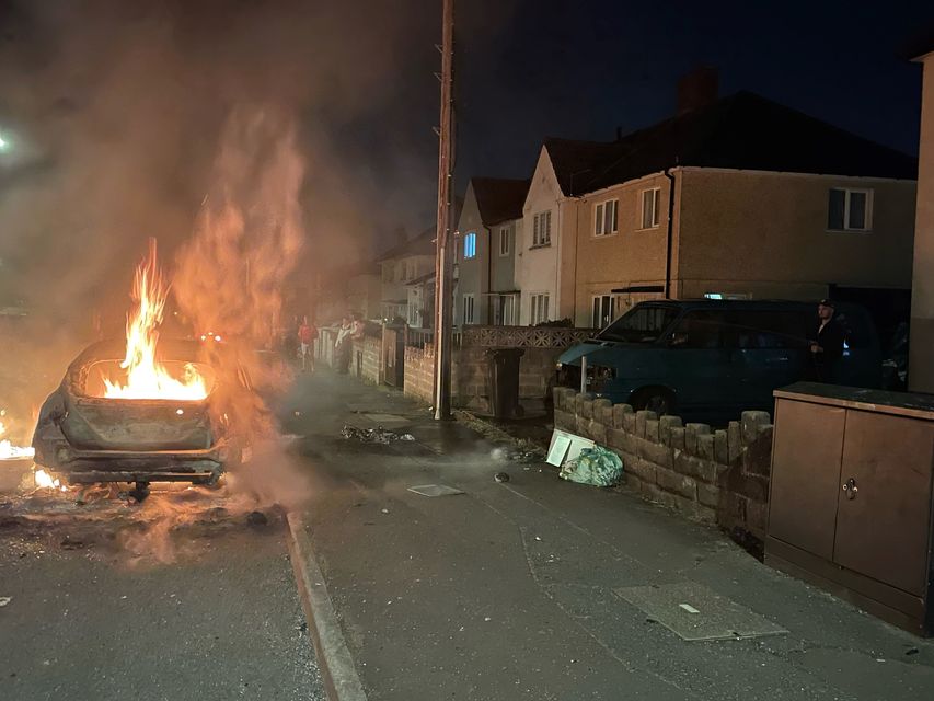 Cars were set alight during the disturbance (Bronwen Weatherby/PA Wire)