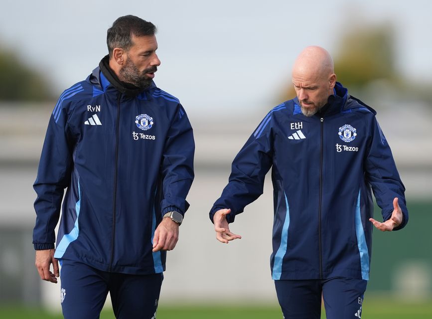 Ruud van Nistelrooy, left, has been put in interim charge after Ten Hag’s exit (Martin Rickett/PA)