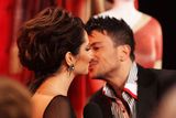 thumbnail: LONDON, ENGLAND - FEBRUARY 15: (UK TABLOID NEWSPAPERS OUT) Cheryl Cole is greeted by Peter Andre as she attends The Brit Awards 2011 held at The O2 Arena on February 15, 2011 in London, England. (Photo by Dave Hogan/Getty Images)