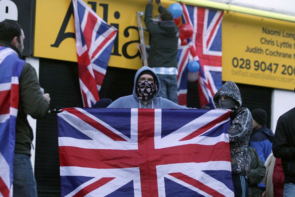 Loyalist hold protest at Naomi Long's east Belfast Alliance office following a council vote last night which will see the Union Flag only follow certain days.  Loyalist protesters pictured on the Newtownards Road during the protest