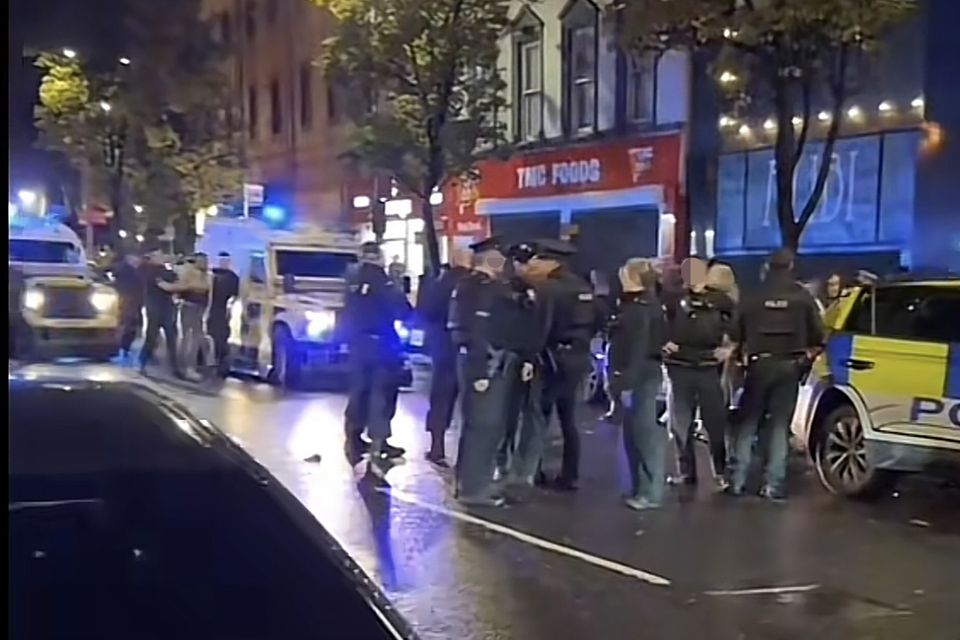 Police at the scene of a mass brawl in Belfast City Centre