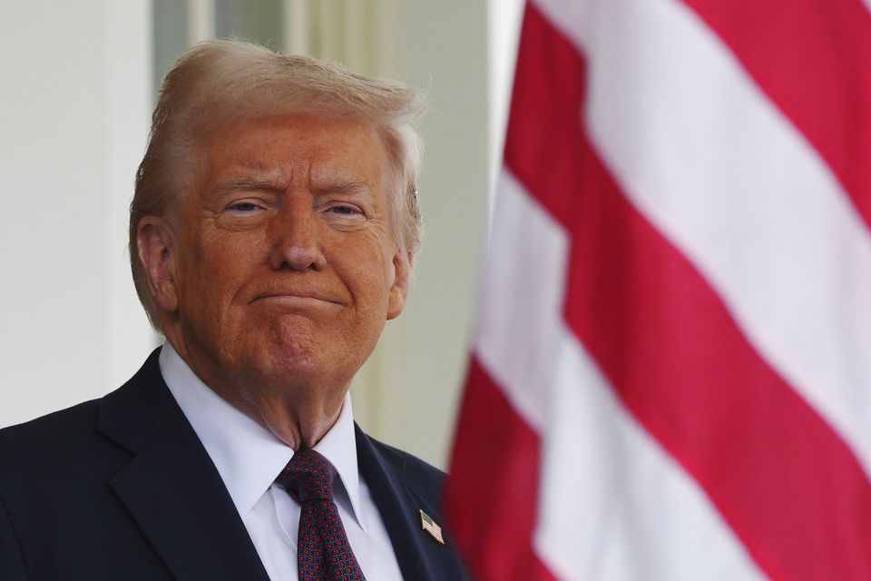 President Donald Trump waits to greet British Prime Minister Keir Starmer at the White House (Carl Court/Pool via AP)