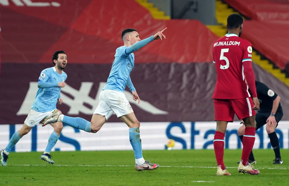 Phil Foden capped a superb display at Anfield by scoring his side’s fourth (Jon Super/PA)