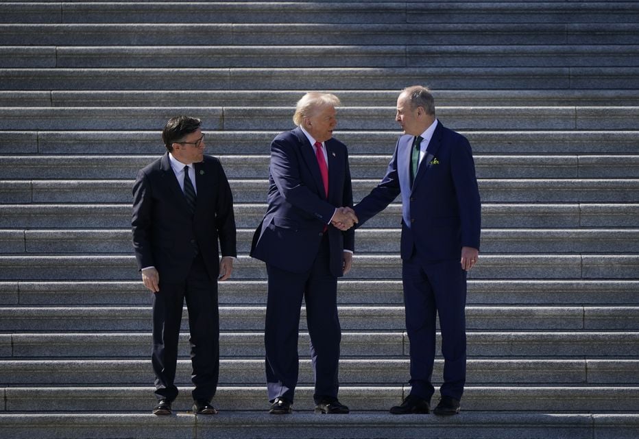 The Speaker of the United States House of Representatives Mike Johnson, US President Donald Trump and Taoiseach Micheal Martin on the steps of the US Capitol (Niall Carson/PA)