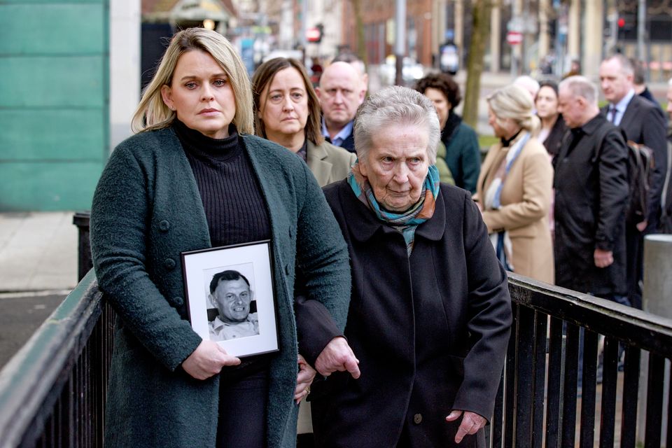 Sean Brown’s daughter Clare Loughran and his widow Bridie Brown arriving at Belfast High Court (Liam McBurney/PA).