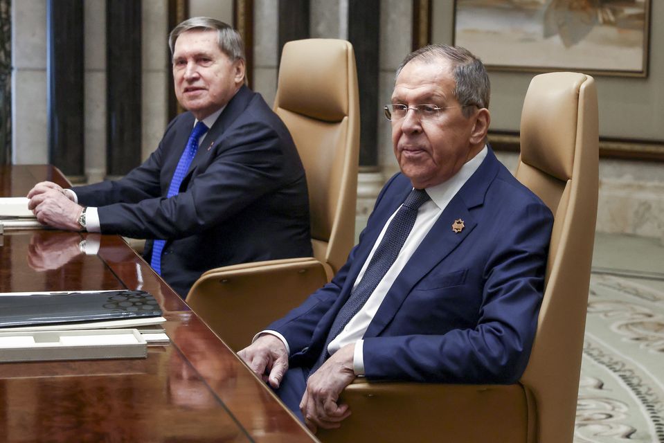 Russian foreign minister Sergei Lavrov, right, sits next to Russian President Vladimir Putin’s foreign policy advisor Yuri Ushakov during a meeting with US officials (Evelyn Hockstein/Pool Photo via AP)