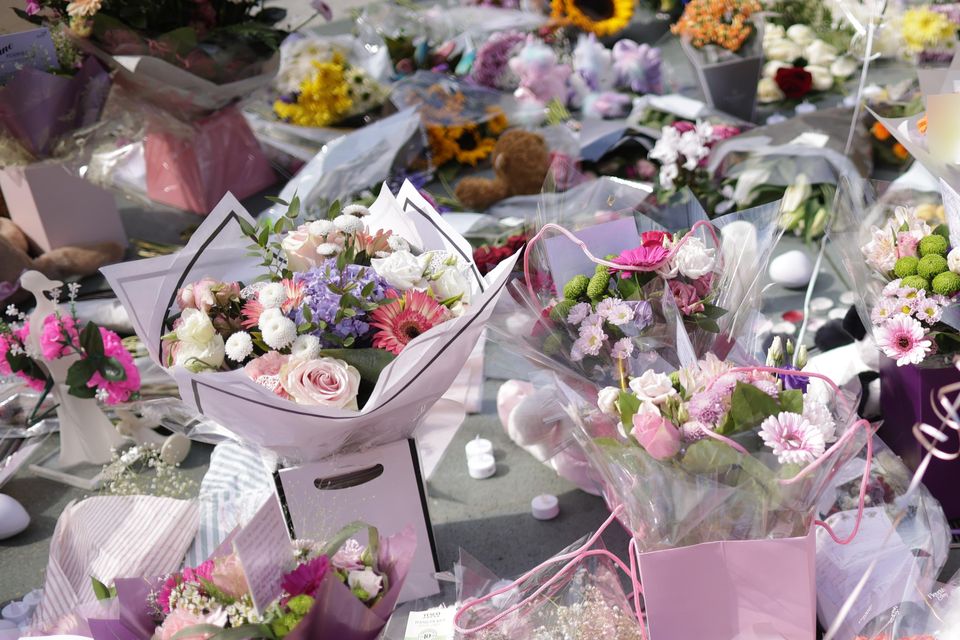 Flowers and tributes outside the Atkinson Art Centre Southport (James Speakman/PA)