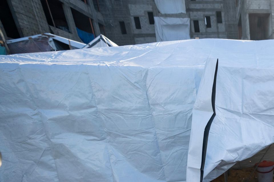 Palestinians in a makeshift tent camp in the Muwasi area (Fatima Shbair/AP)