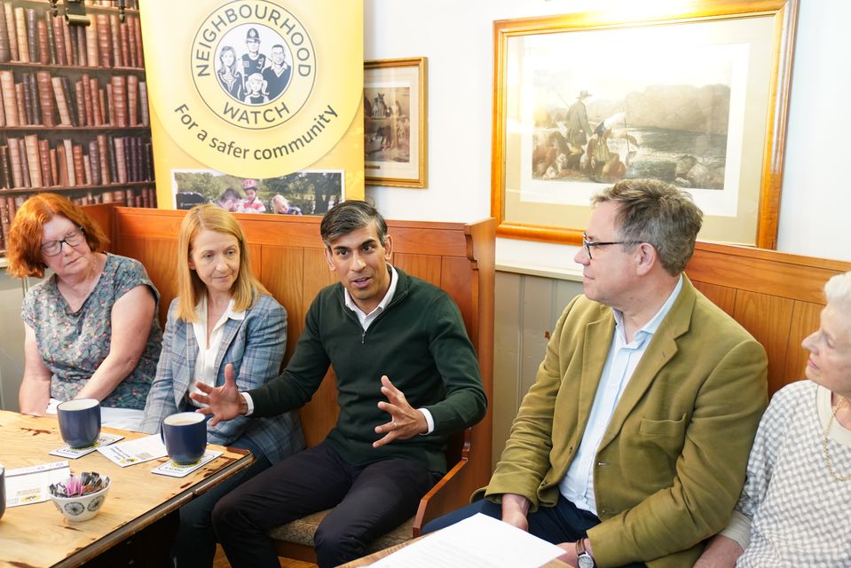 Prime Minister Rishi Sunak attends a Neighbourhood Watch meeting at the Dog and Bacon pub in Horsham, West Sussex, while on the General Election campaign trail (Gareth Fuller/PA) (Gareth Fuller/PA)