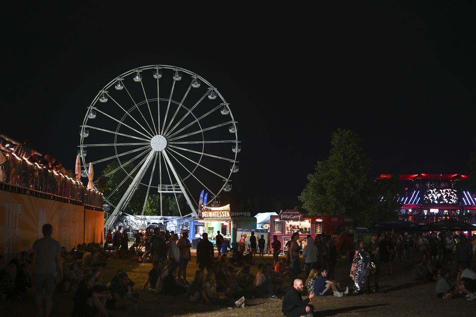 The operator of the Ferris wheel told dpa that no passengers had been sitting in the gondola in which the fire started (Heiko Rebsch/dpa via AP)