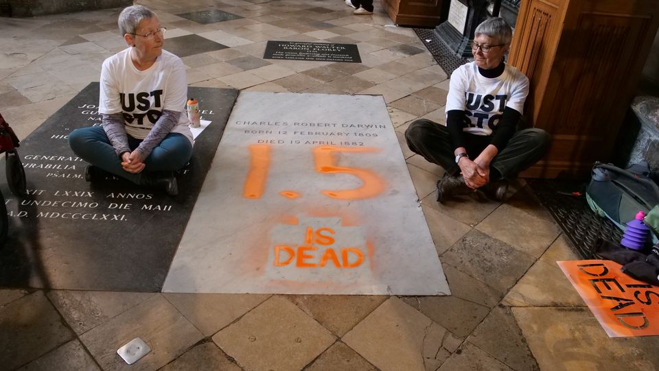 Diane Bligh and Alyson Lee spray-painted Charles Darwin’s grave in the north aisle of the nave of Westminster Abbey (Just Stop Oil/PA)