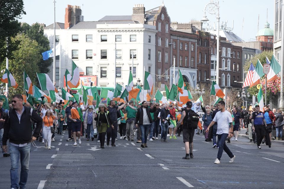 People march through Dublin city centre during an anti-immigration protest (Brian Lawless/PA)