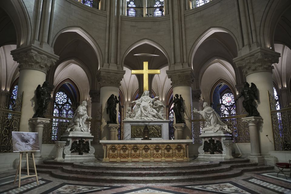 The repaired altar designed by French artist and designer Guillaume Bardet is seen in the heart of Notre Dame (Christophe Petit Tesson, pool via AP)