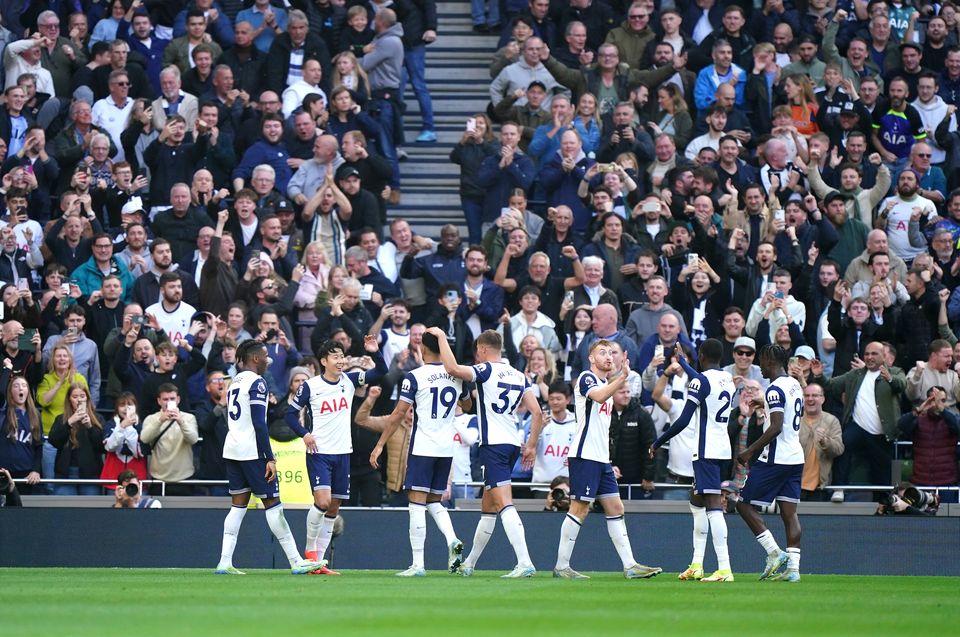 Tottenham’s Son Heung-Min celebrates scoring their side’s fourth goal (PA)