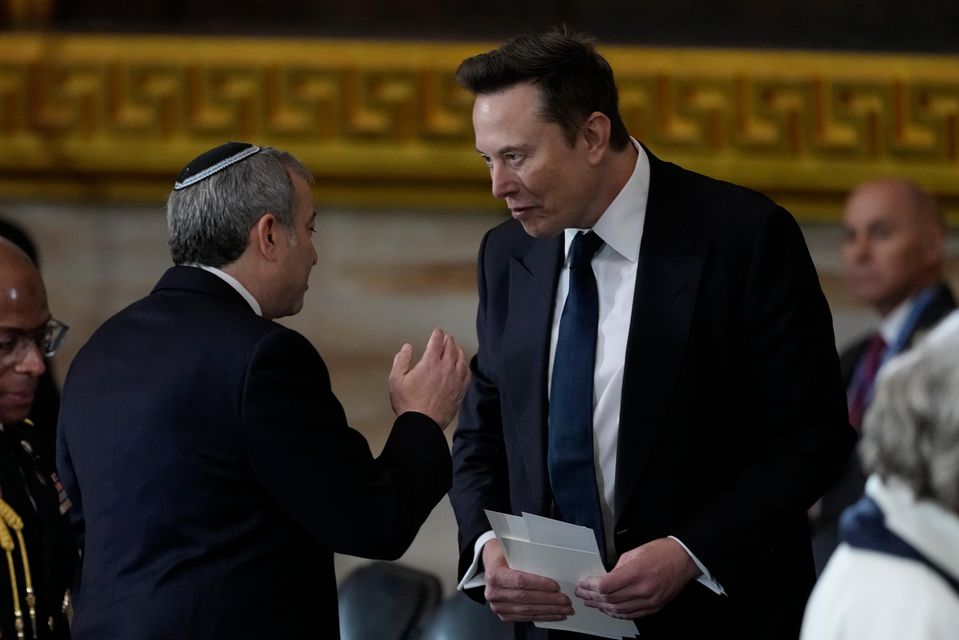 Elon Musk arrives before the 60th Presidential Inauguration in the Rotunda of the US Capitol (Julia Demaree Nikhinson/AP)