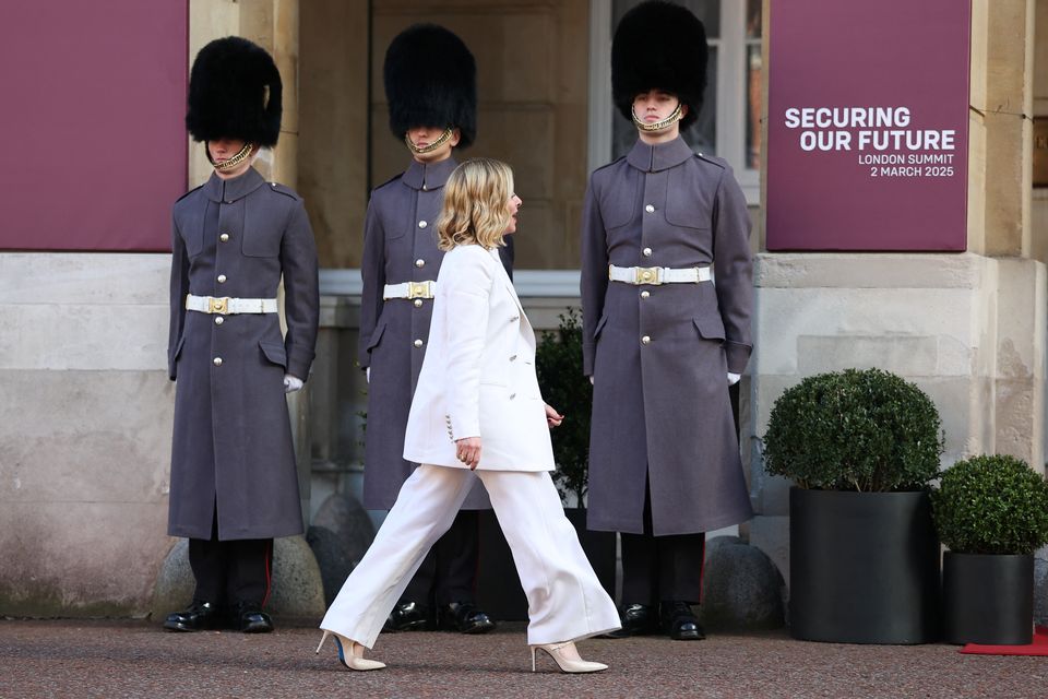 Italian Prime Minister Giorgia Meloni walks outside Lancaster House, London, as she arrives for a European leaders’ summit on the situation in Ukraine (Toby Melville/PA)