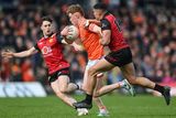 thumbnail: Conor Turbitt of Armagh in action against Ceilum Doherty, left, and Finn McElroy of Down