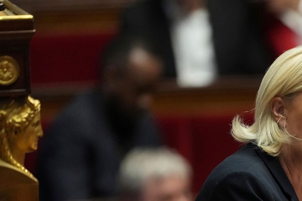 French far-right leader Marine Le Pen warned that pressure on Emmanuel Macron will continue to get stronger (Michel Euler/AP)