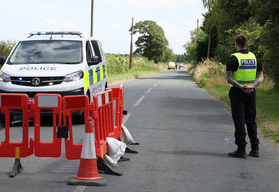 Police near to the scene of an incident involving a light aircraft at Thorganby near York (Nigel Roddis/PA)