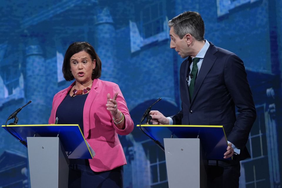 Sinn Fein leader Mary Lou McDonald and Taoiseach and Fine Gael leader Simon Harris during the final TV leaders’ debate (Niall Carson/PA)