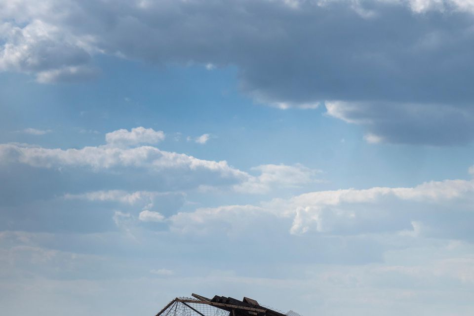 Destroyed Russian tanks lie on a roadside near Sudzha, in the Kursk region (AP Photo)