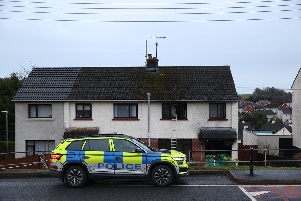 Emergency services at the scene in the Cunninghams Lane area of Dungannon after four people have been ‘led to safety’ by police officers from a house fire in Co Tyrone (Liam McBurney/PA)