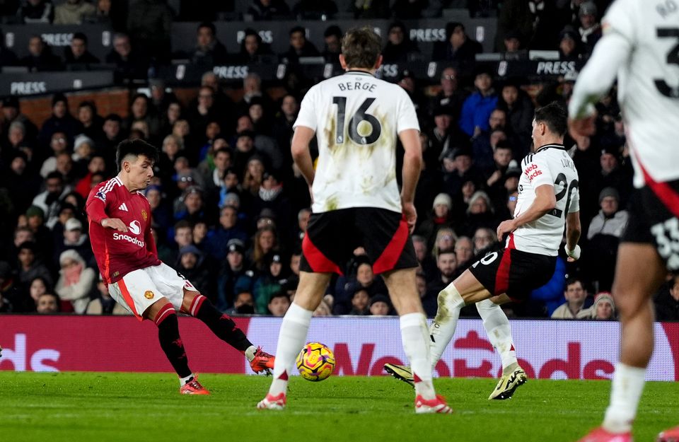 Manchester United’s Lisandro Martinez scores with a deflected shot against Fulham (Bradley Collyer/PA)