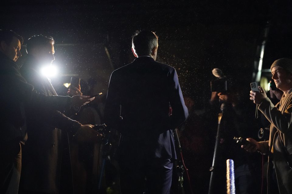 Simon Harris speaks to the media after casting his vote (Niall Carson/PA)