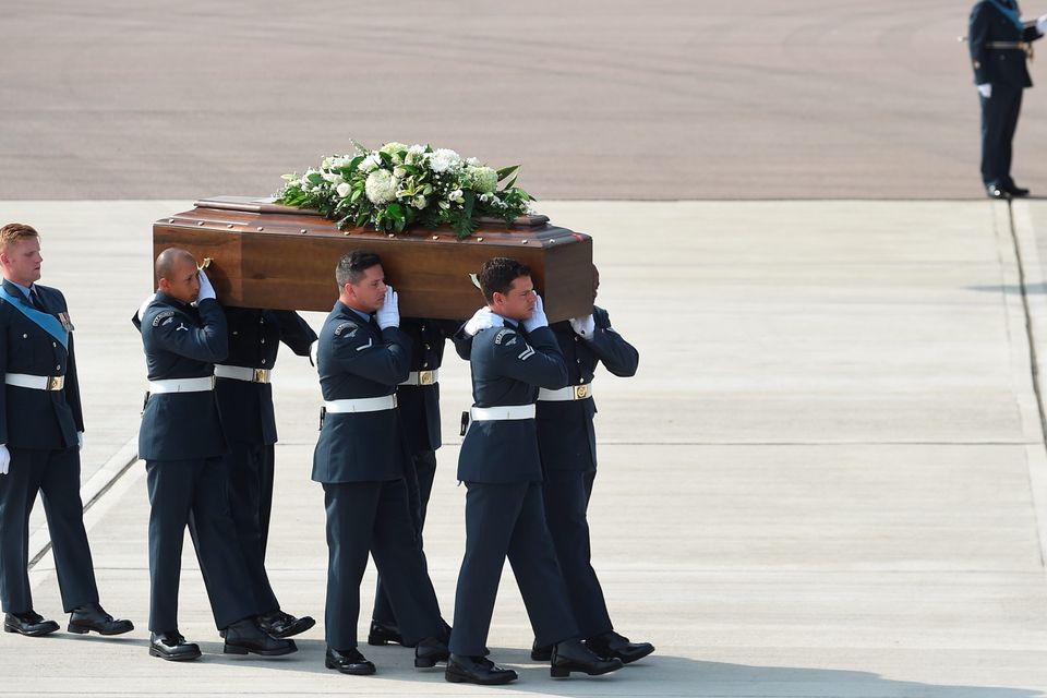 BRIZE NORTON, ENGLAND - JULY 01:  The coffin of Elaine Thwaites, one of the victims of last Friday's terrorist attack, is taken from the RAF C-17 aircraft at RAF Brize Norton in Tunisia, on July 1, 2015 in Brize Norton, England. British nationals Adrian Evans, Charles Evans, Joel Richards, Carly Lovett, Stephen Mellor, John Stollery, and Denis and Elaine Thwaites are the first of the victims of last week's terror attack to be repatriated.  (Photo by Joe Giddens-WPA Pool/Getty Images)