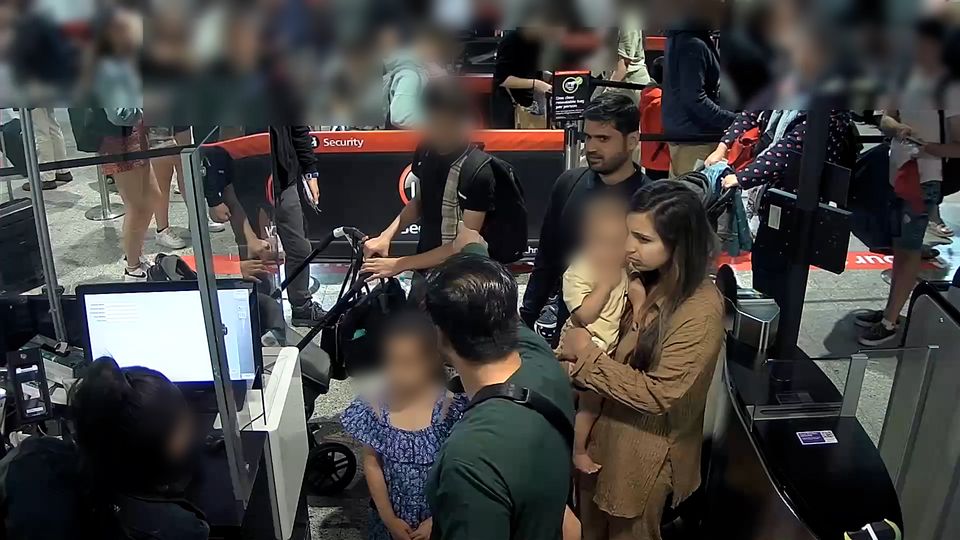 Sara Sharif’s family going through passport control at Heathrow Airport in London (Surrey Police/PA)