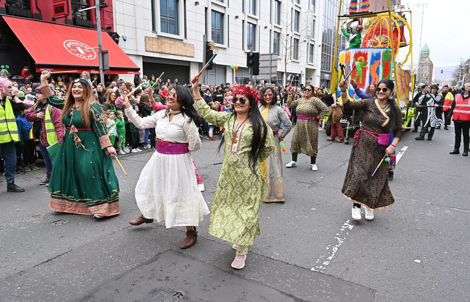 Performers and floats take part in the St. Patrick's Day parade, as it makes its way through Belfast city centre (Presseye)