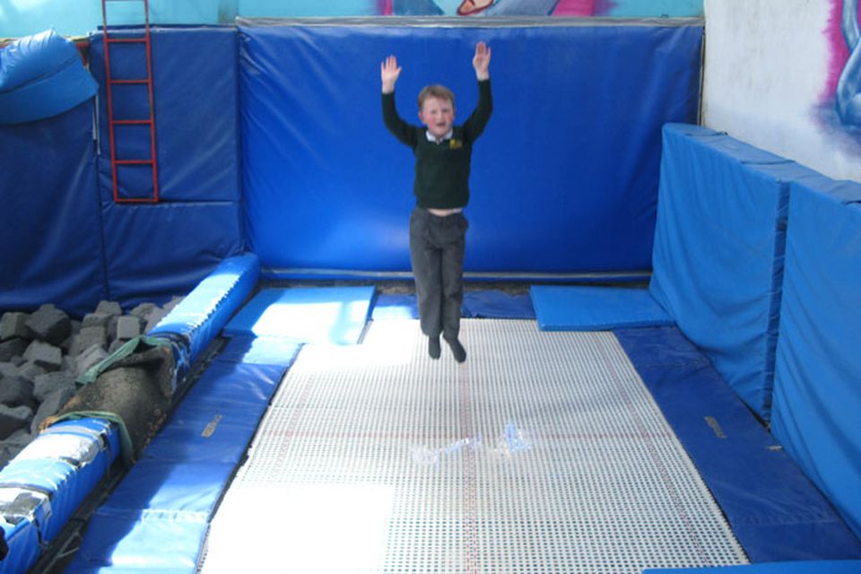 Six-year-old Lucas sees how high he can bounce on the trampoline