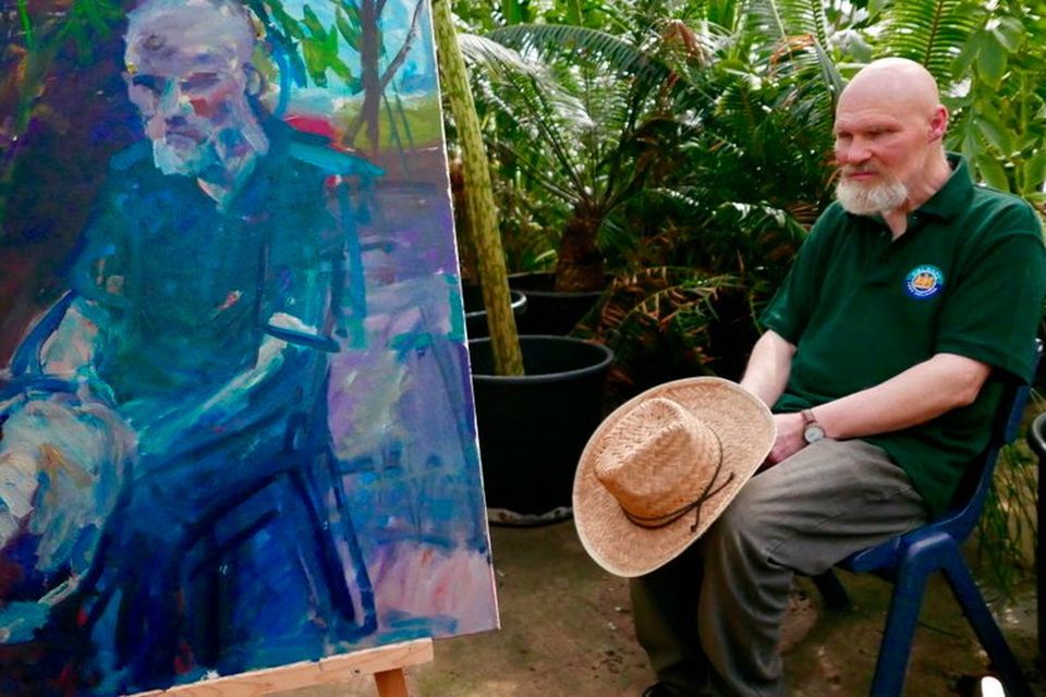 Archie Parke with his canvas by Belfast artist Brian Ballard