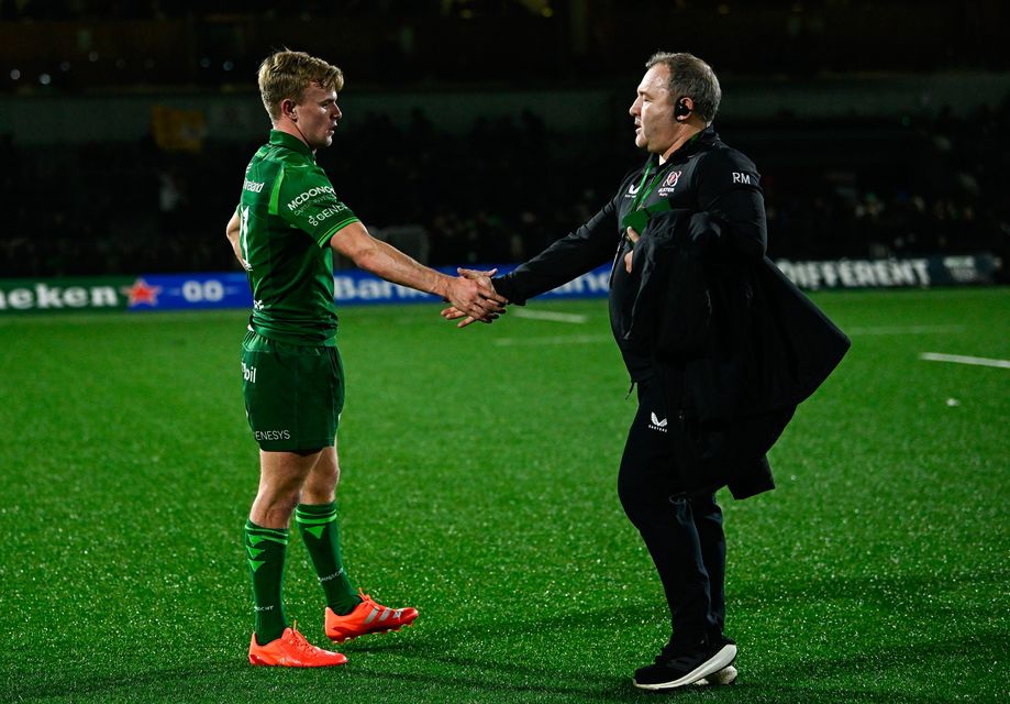 Connacht scrum-half Ben Murphy shakes hands with his father, and Ulster head coach, Richie Murphy. Photo: Seb Daly/Sportsfile