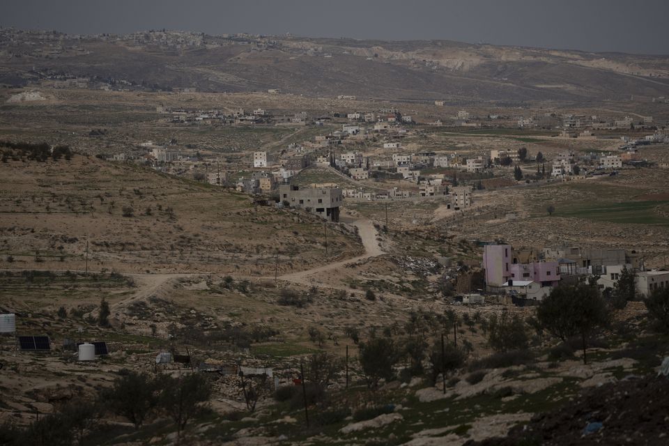 Palestinian houses are seen in the West Bank (Leo Correa/AP)