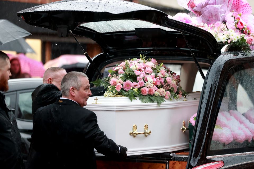 The coffin of Chloe Ferris is carried out of the hearse at St Paul’s Church in Belfast (Liam McBurney/PA)