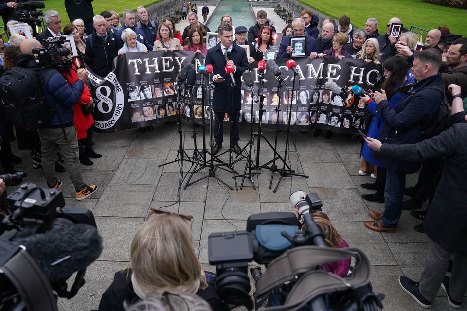 Darragh Mackin speaking to the media in front of survivors, family members and supporters after a verdict of unlawful killing was returned in the Stardust fire inquest (Brian Lawless/PA)