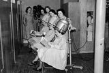 thumbnail: Manhattan Beauty Salon, Corn Market. Female customers having their hair styled. 7/5/1940