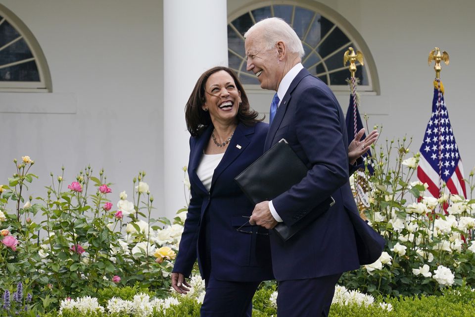 President Joe Biden, right, walks with Vice President Kamala Harris (Evan Vucci/AP)