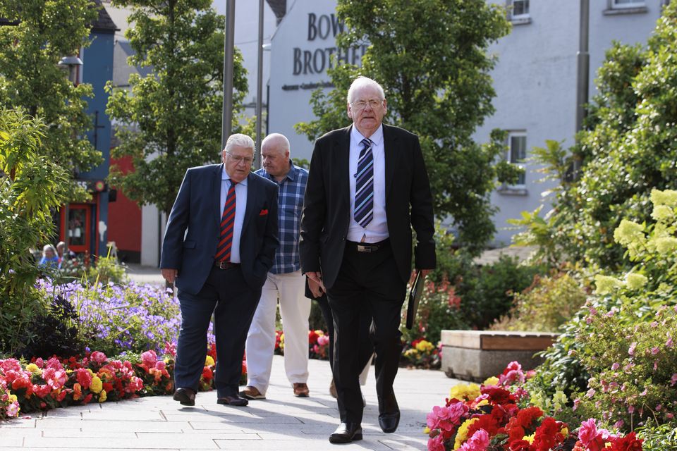 Omagh bomb campaigners Stanley McCombe, left, who lost his wife, Ann; and Michael Gallagher, right, who lost his son, Aiden, arriving at the Strule Arts Centre in Omagh (Liam McBurney/PA)