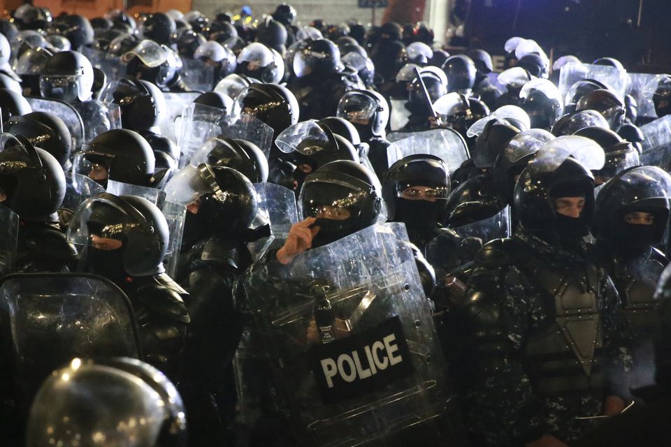 Police block demonstrators outside the parliament during a protest against the government’s decision to suspend negotiations on joining the European Union in Tbilisi (AP Photo/Zurab Tsertsvadze)