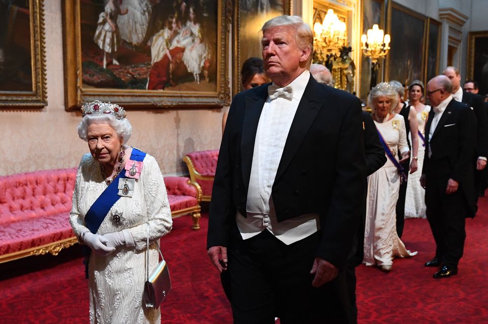 The Queen and US President Donald Trump making their way to the ballroom at the 2019 state banquet (Victoria Jones/PA)