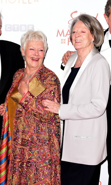 Dame Judi Dench, left, with Dame Maggie Smith at a premiere in 2015 (Ian West/PA)