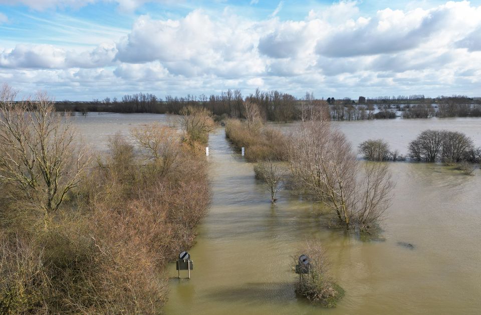 The A1101 in Welney, Norfolk, flooded in February (Joe Giddens/PA)