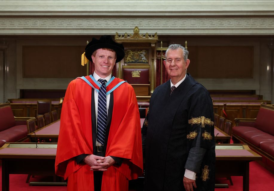 Edwin Poots hosted a ceremony at Stormont for Mr Kennedy (NI Assembly/PA)