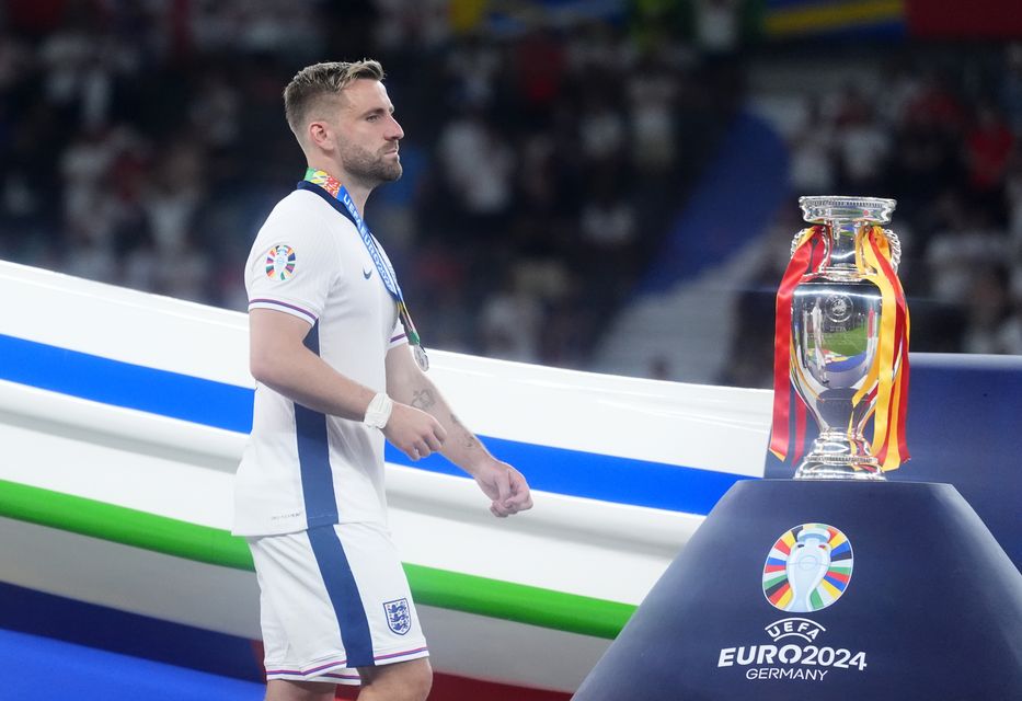 Luke Shaw walks past the Henri Delaunay Cup (Adam Davy/PA)