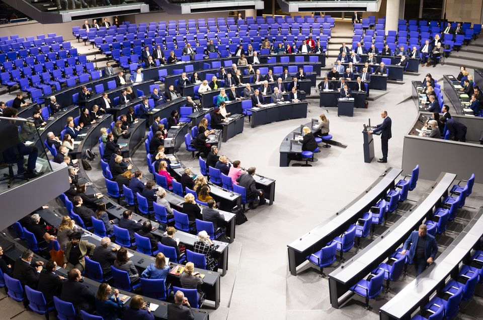 German opposition leader and Christian Union parties floor leader Friedrich Merz speaks after a debate and voting about migration at Bundestag (Markus Schreiber/AP)